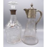 A cut and engraved glass claret jug with engraved EPNS mounts by Hukin & Heath and with mask spout,