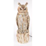 A Naples porcelain figure of an owl, seated on a tree stump, converted for electricity, height 42cm.