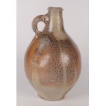 A tiger salt glazed stoneware bellarmine jug, 17th century,