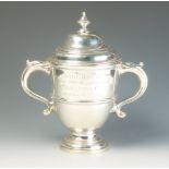 A silver trophy cup and cover in George II style with acanthus capped handles by Charles Stuart