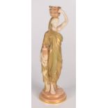 A Royal Worcester porcelain figure of a water carrier, printed mark to the base, No.