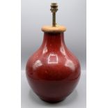 A Chinese red flambe lamp base, of baluster form, total height 41cm.