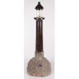 A serpentine table lamp, modelled as a lighthouse, height 53.5cm, diameter of base 19cm.