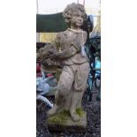 A composition garden statue of a boy holding a basket of fruit, on a square plinth base, 75cm.