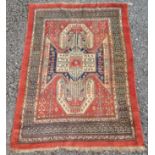 An East Turkestan rug, with a Kazak Sewan design,