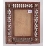 A Syrian wood picture frame, early 20th century, with four square panels with bone,