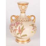 A Royal Worcester ivory ground twin handled vase, shape no.1109, Rd No.35782, height 15.5cm.