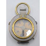 A Negretti & Zambra, London Mark IV compass, in original leather case, diameter 5.2cm.