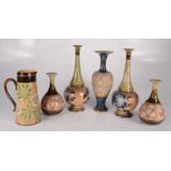 Two pairs of Doulton Lambeth Slaters Patent vases, heights 28.5cm and 17.