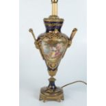 A continental gilt metal and painted porcelain table lamp, late 19th/early 20th century,