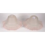 A pair of frosted glass and pink tubelined lightshades, height 17.5cm, diameter 36cm.