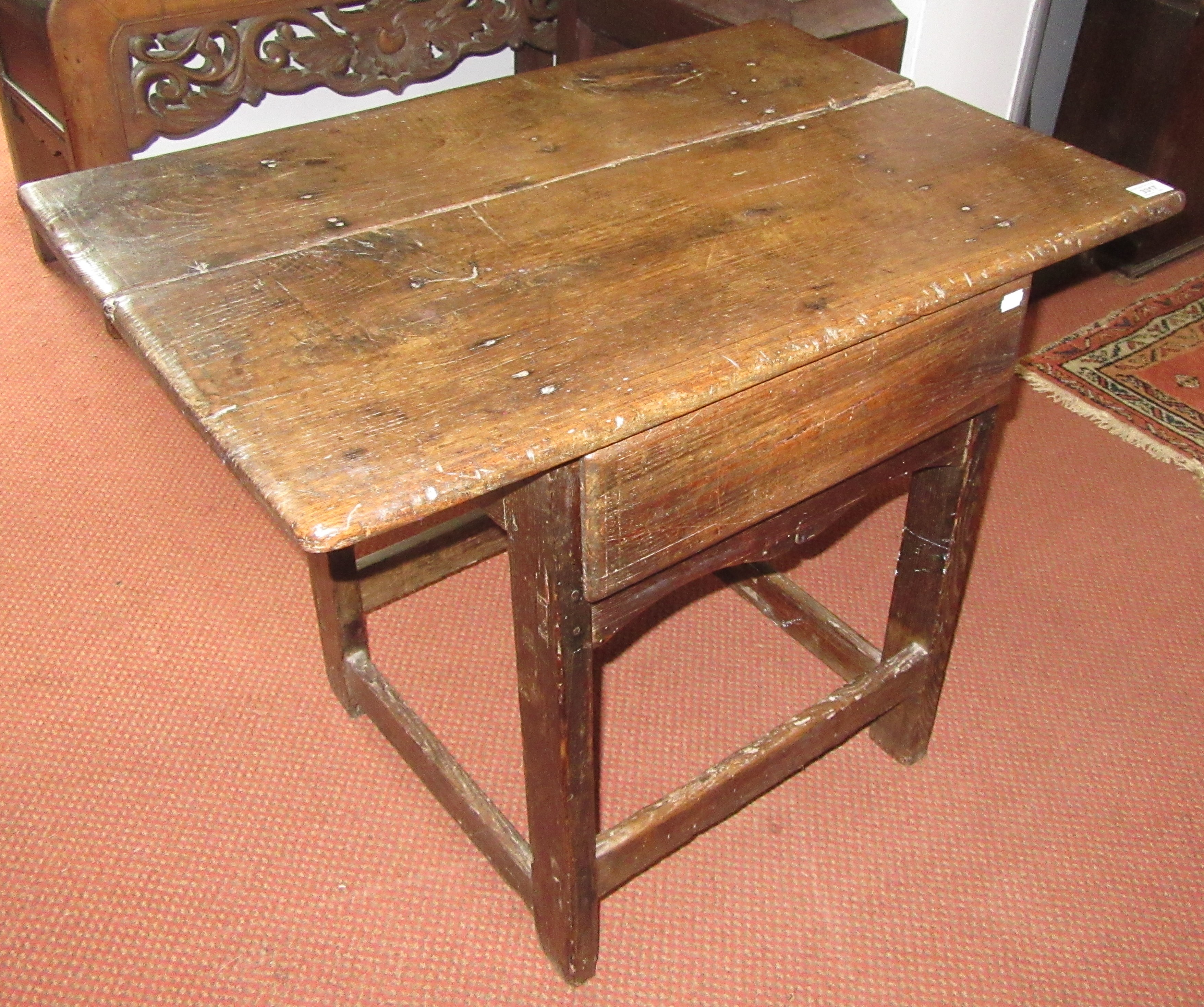 A French oak and elm side table,