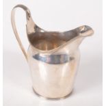 A plain silver George III helmet cream jug with reeded borders, 4.6oz.