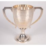 A small St Austell Show twin handled silver cup, 5.9oz.