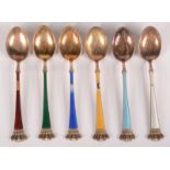 A set of six silver gilt harlequin enamelled demitasse spoons by Ela Denmark retailed by Spritzer &