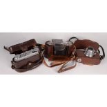 A Weltini camera, a Retina Kodak 1a camera and a Pax M3 camera, all in brown leather cases.