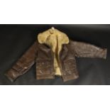 A brown leather sheepskin flying jacket, size 38R.