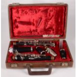 A Boosey & Hawkes, London Emperor clarinet, No.926 and No.484141 in a red velvet lined fitted case.