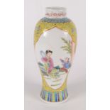 A Chinese porcelain famille rose vase, circa 1900, with four character Kangxi mark, height 23cm.