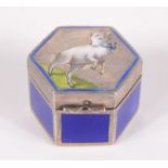 An Austro-Hungarian hexagonal small silver pill box, the lid with a cavorting goat,