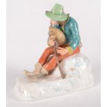 A Rosenthal porcelain figure of a man playing bagpipes, signed Betrer, inscribed K.