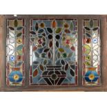 Two stained glass and lead lined windows, late 19th/early 20th century, in wooden frames, 70.3 x 97.