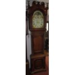 An oak and mahogany eight day longcase clock, the arched painted dial by Matthews Welshpool,