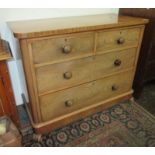 A Victorian mahogany chest of drawers, with two short and two long drawers on front scroll feet,