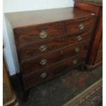 A Regency mahogany chest of drawers, with two short and three long graduated drawers,