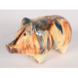 A Weeyms pottery money box, 19th century, in the form of a pig,