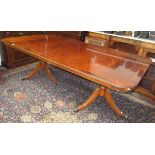 A reproduction Regency style twin pedestal dining table, 112cm x 310cm,