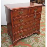 A Brights of Nettlebed burr walnut serpentine chest of drawers,
