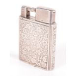 A silver George Stockwell small Everest cigarette lighter with leaf decoration,