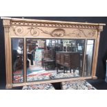 A Regency giltwood wall mirror,