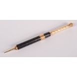 An Aikin Lambert & Co 18ct gold mounted dip pen/propelling pencil,