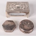 A silver late Victorian matchbox holder and two modern silver boxes.