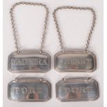A set of three silver decanter labels by John Hutson 1795 for Sherry, Port and Madeira,