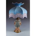 A Doulton Silicon Ware table lamp in the form of an owl, converted from an oil lamp,