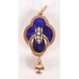 A high purity gold and blue enamel pendant.