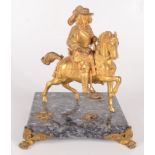 A gilt bronze figure of a cavalier on horseback, late 19th/early 20th century,
