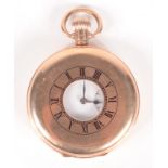 A Dennison 9ct gold half hunter keyless pocket watch with 15 jewel Swiss movement.