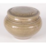 A Chinese celadon studio pottery jar and cover,