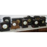 Eight Victorian black slate and marble mantle clocks,