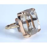A 9ct gold ring set a large topaz.