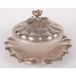 A William IV butter dish by Barnard on silver fluted base,