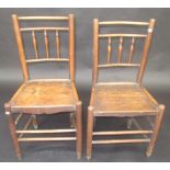 A set of four early 19th century Lancashire spindle back chairs with solid seats.