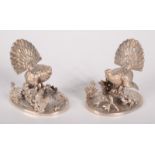 A pair of silver menu stands,