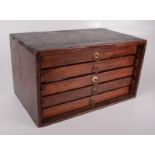 A stained pine five drawer collector's chest, containing Meccano parts, height 21.5cm, width 38.