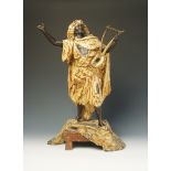 A good spelter figure after Arthur Waagen of a singing North African playing an African lyre 19th