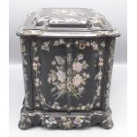 A Victorian papier mache cabinet, with mother of pearl floral decoration,